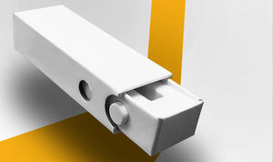 A white, child proof box 3d image partially sliding out of a shell with a button press child safety lock mechanism.