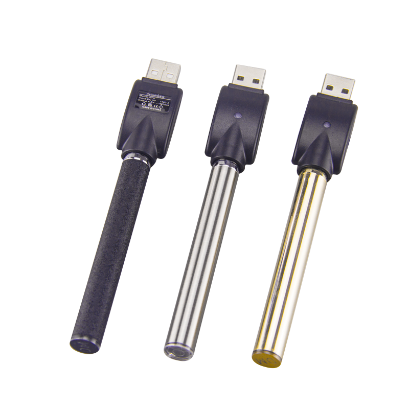Three DMLift Inc 510 battery pens in gold, silver, and embossed black. All with usb charging devices mounted onto the 510 threading